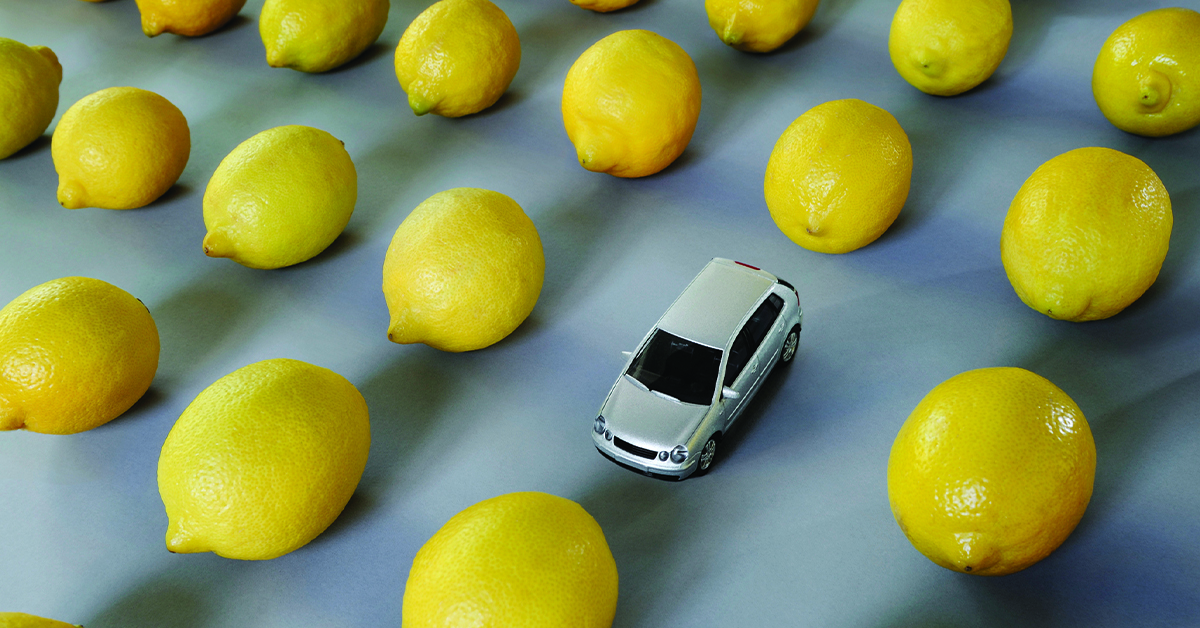 Car and lemons surrounding it